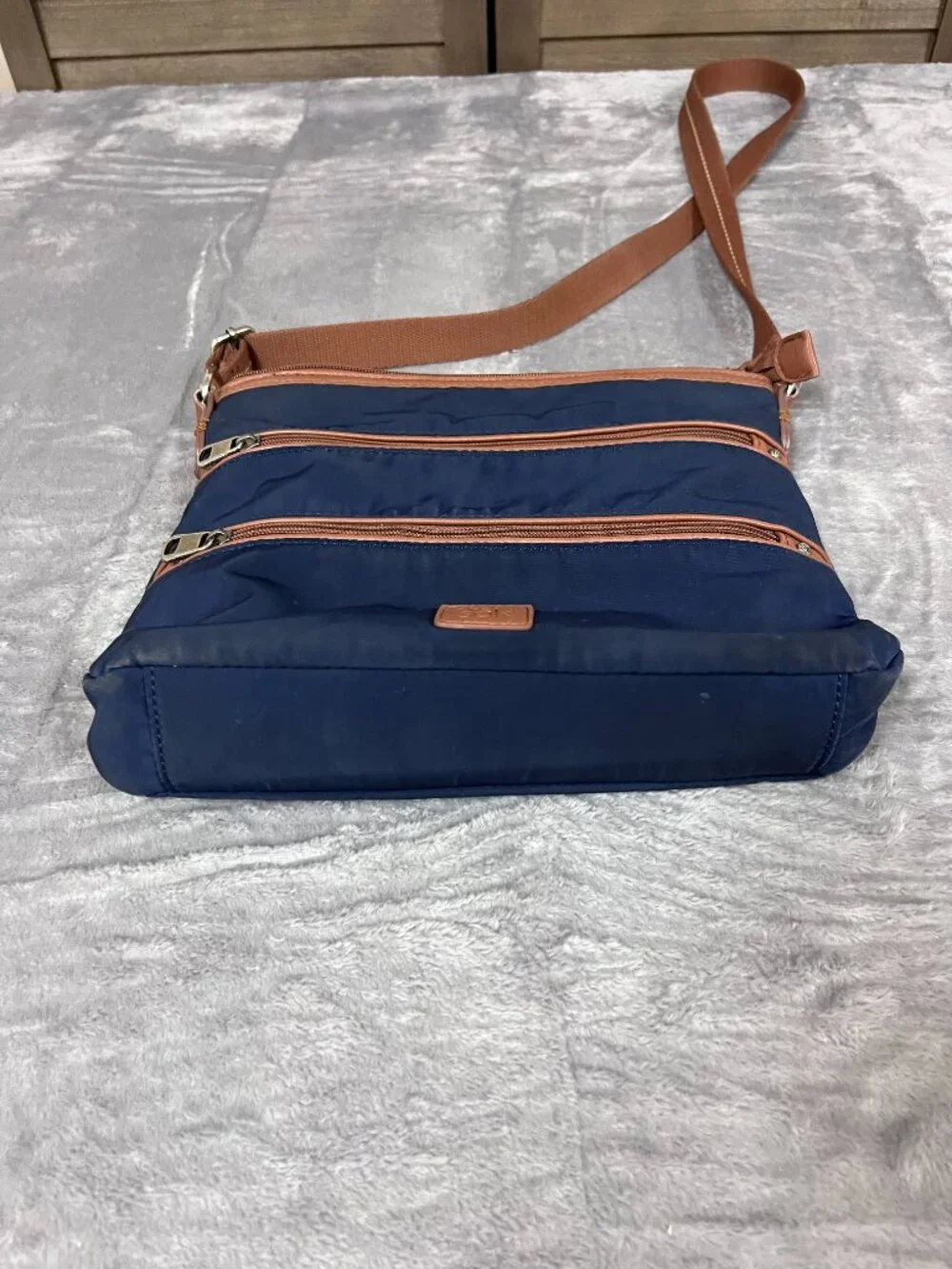 The Sak Navy Nylon Crossbody Bag with Brown Accents
